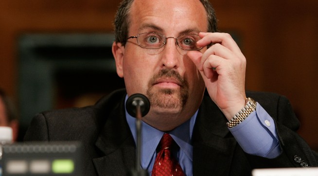 WASHINGTON - JUNE 05:  Bradley Schlozman, associate counsel to the director of the Executive Office for United States Attorneys, and former interim U.S. attorney for the Western District of Missouri, adjusts his glasses as he testifies during a hearing before the Senate Judiciary Committee on Capitol Hill June 5, 2007 in Washington, DC. The hearing focused on prosecutorial independence of the Justice Department and the firing of the eight U.S .Attorneys.  (Photo by Alex Wong/Getty Images) *** Local Caption *** Bradley Schlozman