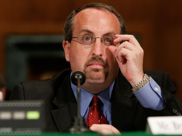 WASHINGTON - JUNE 05:  Bradley Schlozman, associate counsel to the director of the Executive Office for United States Attorneys, and former interim U.S. attorney for the Western District of Missouri, adjusts his glasses as he testifies during a hearing before the Senate Judiciary Committee on Capitol Hill June 5, 2007 in Washington, DC. The hearing focused on prosecutorial independence of the Justice Department and the firing of the eight U.S .Attorneys.  (Photo by Alex Wong/Getty Images) *** Local Caption *** Bradley Schlozman