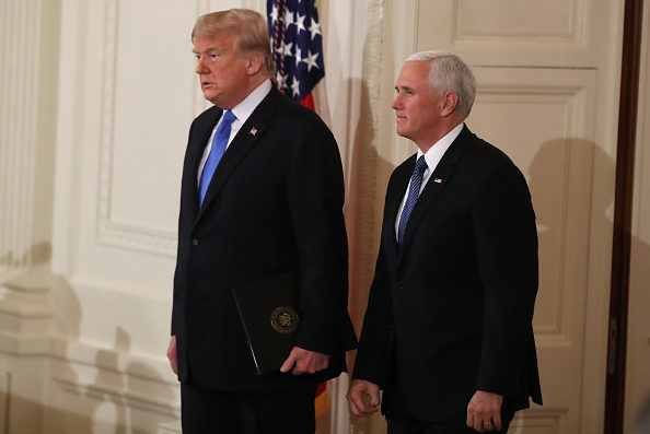 WASHINGTON, DC - NOVEMBER 07: U.S. President Donald Trump arrives with Vice President Mike Pence to give remarks a day after the midterm elections on November 7, 2018 in the East Room of the White House in Washington, DC. Republicans kept the Senate majority but lost control of the House to the Democrats. (Photo by Mark Wilson/Getty Images)