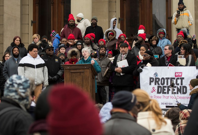 Sister Kathleen Nolan, a member of the Adrian Dominican Sisters in Adrian, Michigan, speaks out against Senate Bill 1171, or Michigan's One Fair Wage proposal, on Wednesday, Nov. 28, 2018, on the steps of the Michigan State Capitol in Lansing, Michigan. It's passage would revoke the raise Michigan’s tipped workers get under existing legislation. (AP Photo/Matthew Dae Smith/Lansing State Journal)