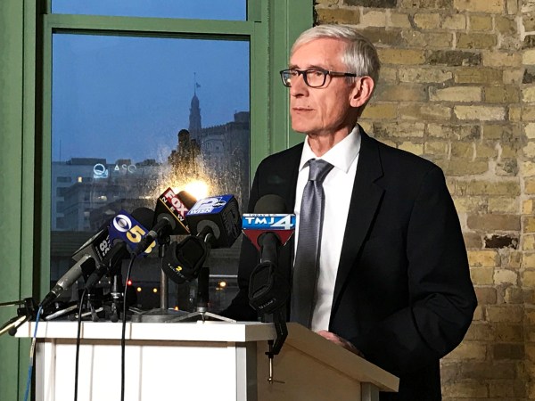 Wisconsin Gov.-elect Tony Evers speaks at the Ward 4 building in Milwaukee on Sunday, Dec. 2, 2018. Democrats in Wisconsin girded for a fight and encouraged voters to speak out as Republicans prepared to move ahead quickly this week with a highly unusual and sweeping lame-duck session to pass a series of proposals that would weaken both Democratic Gov.-elect Evers and Attorney General-elect Josh Kaul. (Meg Jones/Milwaukee Journal-Sentinel via AP)