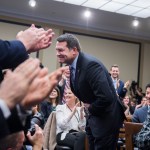 UNITED STATES - NOVEMBER 30: Rep.-elect Mark Green, R-Tenn.,  takes a bow after drawing number 85, the last pick of office space, during the new member room lottery draw for office space in Rayburn Building on November 30, 2018. (Photo By Tom Williams/CQ Roll Call)