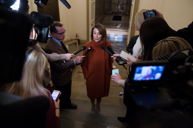 UNITED STATES - DECEMBER 11: House Minority Leader Nancy Pelosi, D-Calif., talks with reporters in the Capitol arriving back from a White House meeting with President Trump, Vice President Pence and Senate Minority Leader Charles Schumer, D-N.Y., about the border wall and a potential government shutdown on December 10, 2018.(Photo By Tom Williams/CQ Roll Call)