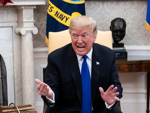 WASHINGTON, DC - DECEMBER 11 : President Donald J. Trump debates with House Minority Leader Nancy Pelosi, D-Calif., left, and Senate Minority Leader Chuck Schumer, D-N.Y., right, as Vice President Mike Pence listens during a meeting in the Oval Office of White House on Tuesday, Dec. 11, 2018 in Washington, DC. (Photo by Jabin Botsford/The Washington Post via Getty Images)