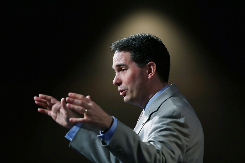 ORLANDO, FL - JUNE 02:  Wisconsin Governor Scott Walker and possible Republican presidential candidate speaks during the Rick ScottÕs Economic Growth Summit held at the DisneyÕs Yacht and Beach Club Convention Center on June 2, 2015 in Orlando, Florida. Many of the leading Republican presidential candidates are scheduled to speak during the event.  (Photo by Joe Raedle/Getty Images)