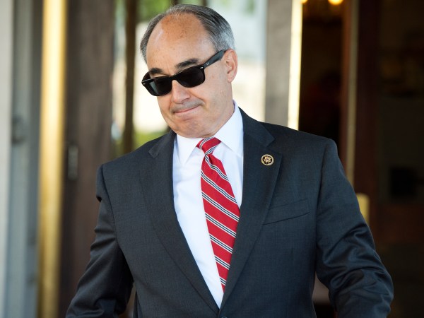 UNITED STATES - JUNE 16: Rep. Bruce Poliquin, R-Me., leaves a meeting of House Republicans at the at the RNC, June 16, 2014. (Photo By Tom Williams/CQ Roll Call)