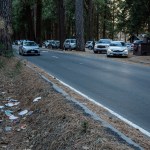 HOLD FOR PERMISSION-In this Monday, Dec. 31, 2018 photo provided by Dakota Snider shows a road lined with trash in Yosemite National Park, Calif. Human feces, overflowing garbage, illegal off-roading and other damaging behavior in fragile areas were beginning to overwhelm some of the West's iconic national parks on Monday, as a partial government shutdown left the areas open to visitors but with little staff on duty.(Dakota Snider via AP)