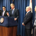Los Angeles City Attorney Mike Feuer, at podium, speaks at a news conference in Los Angeles Friday, Jan. 4, 2019. Feuer said that owners of The Weather Channel app, one of the most popular mobile weather apps, used it to track people's every step and profit off that information. Feuer said the company misled users of the popular app to think their location data will only be used for personalized forecasts and alerts. A spokesman for app owner IBM Corp. says it's been clear about the use of location data and will vigorously defend its "fully appropriate" disclosures. (AP Photo/Brian Melley)