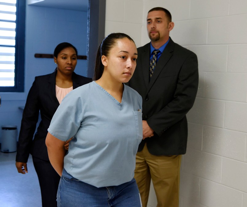Cyntoia Brown, a woman serving a life sentence for killing a man when she was a 16-year-old prostitute, enters her clemency hearing Wednesday, May 23, 2018, at Tennessee Prison for Women in Nashville, Tenn. (Lacy Atkins /The Tennessean via AP, Pool)