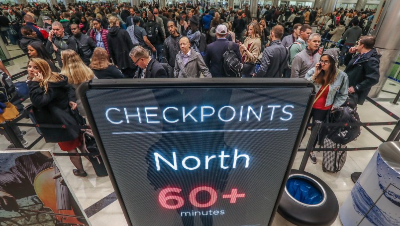 January 14, 2019 Atlanta: Security lines at Hartsfield-Jackson International Airport stretched more than an hour long Monday morning, Jan. 14, 2019 causing travelers to miss flights amid the partial federal shutdown. At a time when the world’s busiest airport has its biggest crowds, there were at least six security lanes closed at domestic terminal security checkpoints, while passengers waited in lines that stretched through the terminal and were winding through baggage claim. The long lines signaled staffing shortages at security checkpoints, as TSA officers have been working without pay since the federal shutdown began Dec. 22. Airport officials normally advise travelers to get to the airport two hours before domestic flights, but on Monday morning Hartsfield-Jackson spokesman Andrew Gobeil advised that travelers should consult with their airlines. Travelers may need to get to the airport even earlier due to the long waits. JOHN SPINK/JSPINK@AJC.COM
