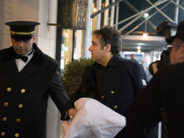 Michael Cohen arrives at his home with his arm in a sling Thursday, Jan. 18, 2019 in New York. The chairman of the House intelligence committee said he would "do what is necessary" to confirm a report that President Donald Trump directed Cohen, then Trump's personal attorney, to lie to Congress about negotiations over a real estate project in Moscow during the 2016 election. (AP Photo/Kevin Hagen)