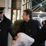 Michael Cohen arrives at his home with his arm in a sling Thursday, Jan. 18, 2019 in New York. The chairman of the House intelligence committee said he would "do what is necessary" to confirm a report that President Donald Trump directed Cohen, then Trump's personal attorney, to lie to Congress about negotiations over a real estate project in Moscow during the 2016 election. (AP Photo/Kevin Hagen)