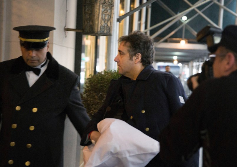 Michael Cohen arrives at his home with his arm in a sling Thursday, Jan. 18, 2019 in New York. The chairman of the House intelligence committee said he would "do what is necessary" to confirm a report that President Donald Trump directed Cohen, then Trump's personal attorney, to lie to Congress about negotiations over a real estate project in Moscow during the 2016 election. (AP Photo/Kevin Hagen)