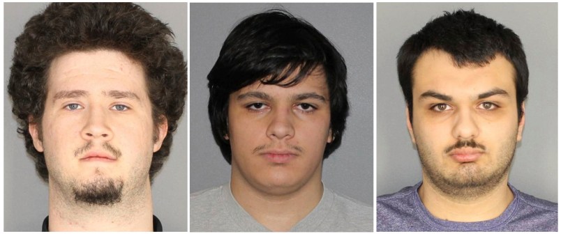 In this combination of three Jan. 22, 2019 photographs released by the Greece Police Department in Greece, NY, Brian Colaneri, left, Andrew Crysel, center, and Vincent Vetromile are shown. Authorities said that the three men were charged with plotting to attack a rural upstate New York Muslim community with explosives. The three Rochester, NY-area men are accused of plotting to attack Islamberg, a 60-acre Muslim enclave west of the Catskills, according to court papers. (Greece Police Department via AP)