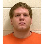 FIL E- This undated photo provided by The Ford County Sheriff's Office in Paxton, Ill., shows Michael McWhorter. McWhorter, is one of three men charged in the bombing of a Minnesota mosque in 2017. Two of three militia members accused of bombing a Minnesota mosque and attempting to bomb an Illinois women's clinic are expected to enter guilty pleas. McWhorter and Joe Morris are scheduled to appear Thursday, Jan 24, 2019, in U.S. District Court in Minnesota for a change of plea hearing. This typically means the defendants will plead guilty. The Clarence, Illinois, men face federal hate crime charges and other counts. A third man, Michael Hari, is also charged. (Ford County Sheriff's Office via AP, File)