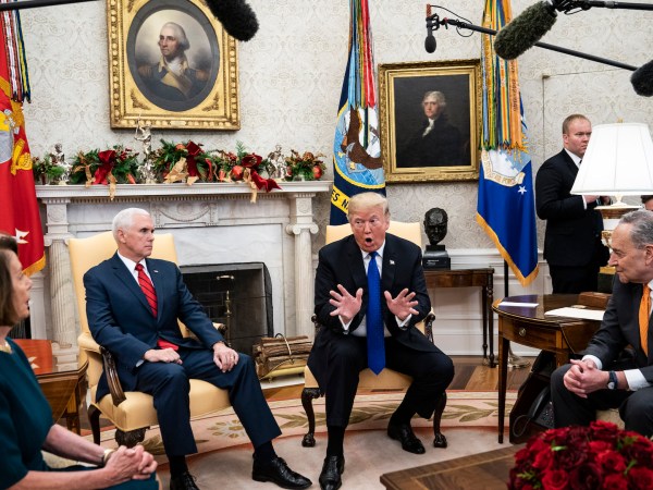 WASHINGTON, DC - DECEMBER 11 : President Donald J. Trump debates with House Minority Leader Nancy Pelosi, D-Calif., left, and Senate Minority Leader Chuck Schumer, D-N.Y., right, as Vice President Mike Pence listens during a meeting in the Oval Office of White House on Tuesday, Dec. 11, 2018 in Washington, DC. (Photo by Jabin Botsford/The Washington Post)