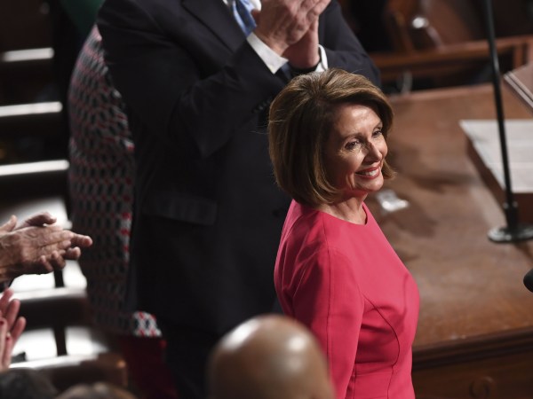 Incoming Speaker of the House Nancy Pelosi reacts to applause during the 116th Congress and swearing-in ceremony on the floor of the US House of Representatives at the US Capitol on January 3, 2019 in Washington,DC. (Photo by SAUL LOEB / AFP)        (Photo credit should read SAUL LOEB/AFP/Getty Images)
