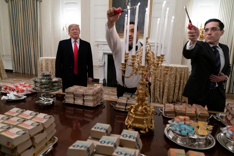January 14, 2019 - Washington, DC, United States President Donald J. Trump presents fast food to be served to the Clemson Tigers to celebrate their Championship at the White House. (Chris Kleponis / Polaris)