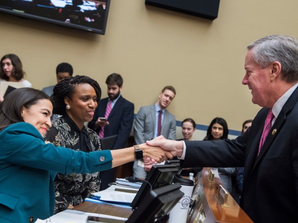 UNITED STATES - JANUARY 29: From left, Reps. Alexandria Ocasio-Cortez, D-N.Y., Ayanna Pressley, D-Mass., Mark Meadows, R-N.C., talk during a House Oversight and Reform Committee business meeting in Rayburn Building on Tuesday, January 29, 2019. (Photo By Tom Williams/CQ Roll Call)