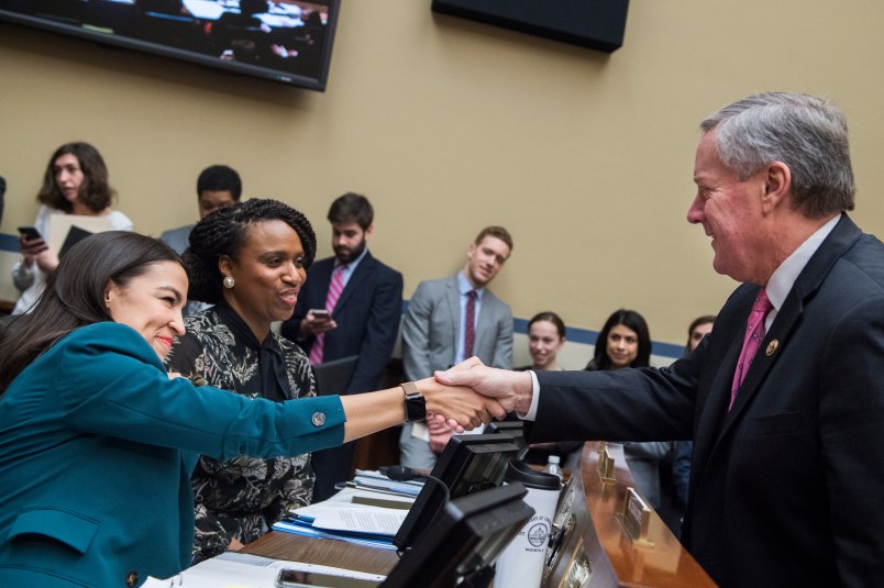 UNITED STATES - JANUARY 29: From left, Reps. Alexandria Ocasio-Cortez, D-N.Y., Ayanna Pressley, D-Mass., Mark Meadows, R-N.C., talk during a House Oversight and Reform Committee business meeting in Rayburn Building on Tuesday, January 29, 2019. (Photo By Tom Williams/CQ Roll Call)
