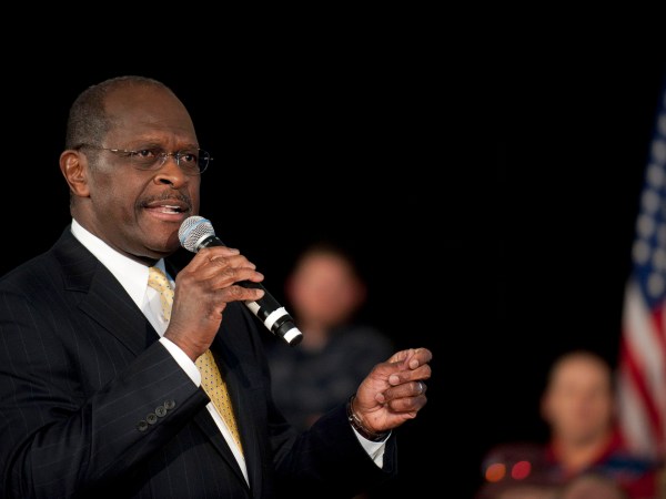 ROCK HILL, SC - DECEMBER 2:  Republican presidential candidate Herman Cain speaks to supporters during a town hall meeting at Laurel Ridge on December 2, 2011 in Rock Hill, South Carolina. Cain said he would make an announcement about his campaign in Atlanta tomorrow.  (Photo by Davis Turner/Getty Images)