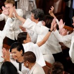 Women members of Congress, including Rep. Alexandria Ocasio-Cortez, D-N.Y., center, cheer after President Donald Trump acknowledges more women in Congress during his State of the Union address to a joint session of Congress on Capitol Hill in Washington, Tuesday, Feb. 5, 2019. (AP Photo/J. Scott Applewhite)