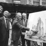 FILE - In this June 28, 1978, file photo, New York Gov Hugh Carey points to an artists' conception of the new New York Hyatt Hotel/Convention facility that will be build on the site of the former Commordore Hotel in New York. Now called the Grand Hyatt New York, the building that helped Donald Trump make a name for himself in his first big deal in Manhattan is being sold to developers who plan to tear it down. From left are: Donald Trump; New York Mayor Mayor Ed Koch; Carey; and Robert T. Dormer, executive vice president of the Urban Development Corp. (AP Photo)