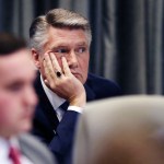 Mark Harris listens to the public evidentiary hearing on the 9th Congressional District investigation Monday afternoon, Feb. 18, 2019, at the North Carolina State Bar in Raleigh.