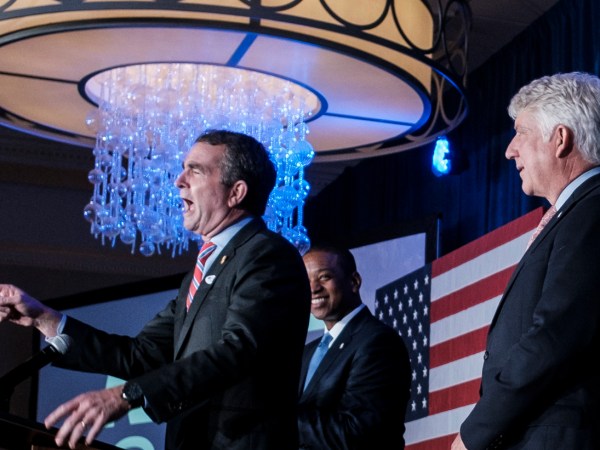 FALLS CHURCH, VIRGINIA - NOVEMBER 6: Virginia Gov. Ralph Northam speaks to supporters as Lt Gov. Justin Fairfax and Attorney General Mark Herring look on as results come in for the Virginia Senate race on Tuesday, November 6, 2018 in Falls Church, Virginia. Senator Tim Kaine went on to win his second term. (Photo by Pete Marovich For The Washington Post)