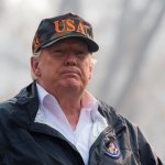 President Donald Trump tours the Skyway Villa Mobile Home and RV Park with Gov. Jerry Brown during his visit of the Camp Fire in Paradise, Calif. on Saturday, November 17, 2018. (Paul Kitagaki Jr./Regional Pool/Sacramento Bee)
