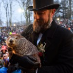 PUNXSUTAWNEY, PA - FEBRUARY 02:Handler AJ Dereume holds Punxsutawney Phil after he did not see his shadow predicting an early spring  during the 133rd annual Groundhog Day festivities on February 2, 2019 in Punxsutawney, Pennsylvania. Groundhog Day is a popular tradition in the United States and Canada. A crowd of upwards of 30,000 people spent a night of revelry awaiting the sunrise and the groundhog's exit from his winter den. If Punxsutawney Phil sees his shadow he regards it as an omen of six more weeks of bad weather and returns to his den. Early spring arrives if he does not see his shadow, causing Phil to remain above ground.   (Photo by Jeff Swensen/Getty Images)