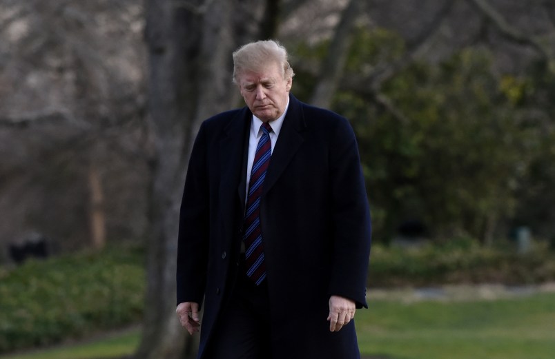 U.S. President Donald Trump walks on the South Lawn of the White House after arriving on Marine One in Washington, D.C., U.S., February 8, 2019. Trump traveled to Walter Reed National Military Medical Center to receive his annual physical exam. Photo by Olivier Douliery/ Abaca Press