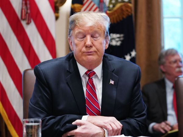 TOPSHOT - US President Donald Trump speaks during a cabinet meeting in the Cabinet Room of the White House in Washington, DC on February 12, 2019. - US President Donald Trump on Tuesday said he wasn't "happy" with a preliminary deal by US lawmakers to provide funding for a border wall with Mexico but added another government shutdown was not likely. "I can't say I'm happy, I can't say I'm thrilled," he told a cabinet meeting in the White House.But he indicated he could supplement the offer from Congress from other sources and lay the dispute to rest. (Photo by MANDEL NGAN / AFP)        (Photo credit should read MANDEL NGAN/AFP/Getty Images)