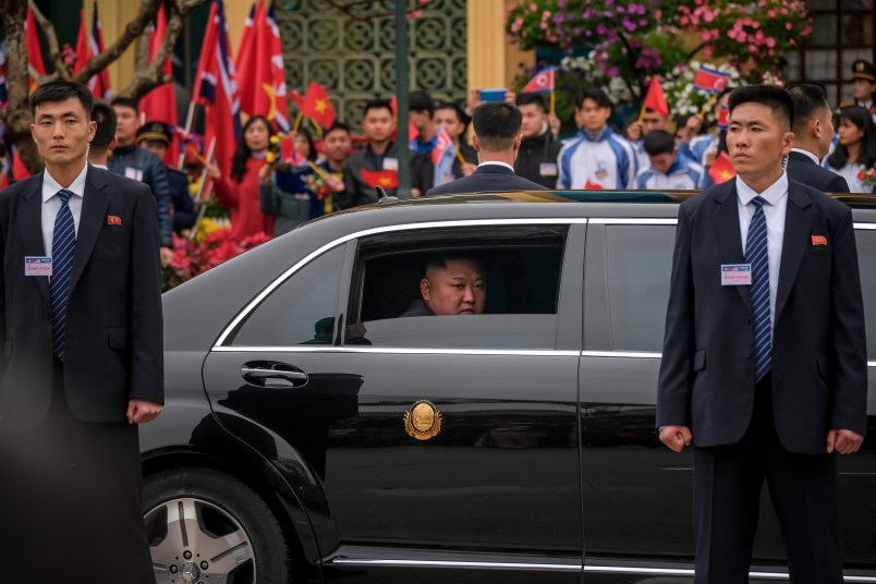 LANG SON, VIETNAM - FEBRUARY 26:  Kim Jong-un waves from his car after arriving by train at Dong Dang railway station near the border with China on February 26, 2019 in Lang Son, Vietnam. North Korea's leader Kim Jong-un arrived in Vietnam for the first time on Tuesday as preparations continue in Hanoi for the summit with U.S President Donald Trump in Hanoi later this week. Reports have indicated that both leaders could agree on a joint statement declaring an end to the 1950-53 Korean War while denuclearization of the Korean Peninsula and ending international sanctions against Pyongyang is expected to be discussed during the summit. (Photo by Linh Pham/Getty Images)