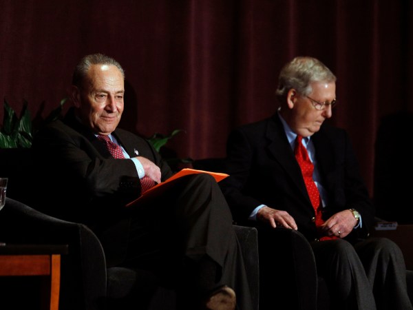LOUISVILLE, KY-FEBRUARY 12: U.S. Senate Majority Leader Mitch McConnell (right) (R-KY) and U.S. Senate Democratic Leader Chuck Schumer (D-NY) wait on stage together at the University of Louisville's McConnell Center where Schumer was scheduled to speak February 12, 2018 in Louisville, Kentucky. Sen. Schumer spoke at the event as part of the Center's Distinguished Speaker Series, and Sen. McConnell introduced him. (Bill Pugliano/Getty Images)