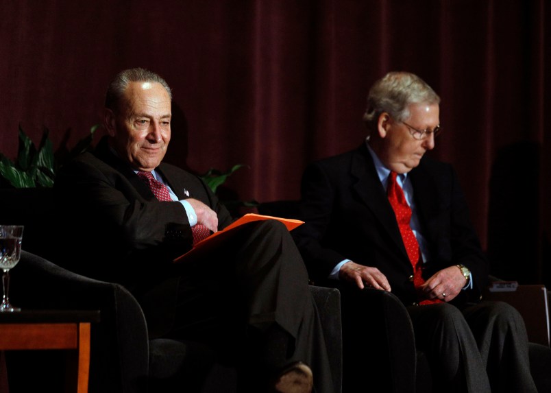 LOUISVILLE, KY-FEBRUARY 12: U.S. Senate Majority Leader Mitch McConnell (right) (R-KY) and U.S. Senate Democratic Leader Chuck Schumer (D-NY) wait on stage together at the University of Louisville's McConnell Center where Schumer was scheduled to speak February 12, 2018 in Louisville, Kentucky. Sen. Schumer spoke at the event as part of the Center's Distinguished Speaker Series, and Sen. McConnell introduced him. (Bill Pugliano/Getty Images)