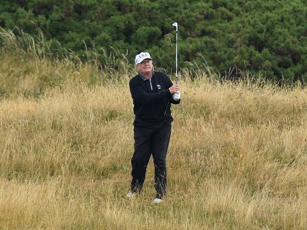 U.S. President Donald Trump plays a round of golf at Trump Turnberry Luxury Collection Resortduring the U.S. President's first official visit to the United Kingdom on July 15, 2018 in Turnberry, Scotland. The President of the United States and First Lady, Melania Trump on their first official visit to the UK after yesterday's meetings with the Prime Minister and the Queen is in Scotland for private weekend stay at his Turnberry.