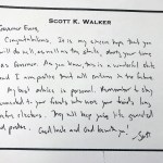 This March 4, 2019 photo shows a hand written note that former Wisconsin Gov. Scott Walker left for his successor, Tony Evers just before he left office in January. Evers on Monday released the note after initially refusing an Associated Press open records request for the document. (AP Photo/Scott Bauer)