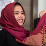 Indonesian Siti Aisyah, left, greets by her lawyer Gooi Soon Seng after a press conference at Indonesian Embassy in Kuala Lumpur, Malaysia, Monday, March 11, 2019. The Indonesian woman held two years on suspicion of killing the North Korean leader's half brother was freed from custody Monday, March 11, 2019 after prosecutors unexpectedly dropped the murder charge against her.  (AP Photo/Vincent Thian)