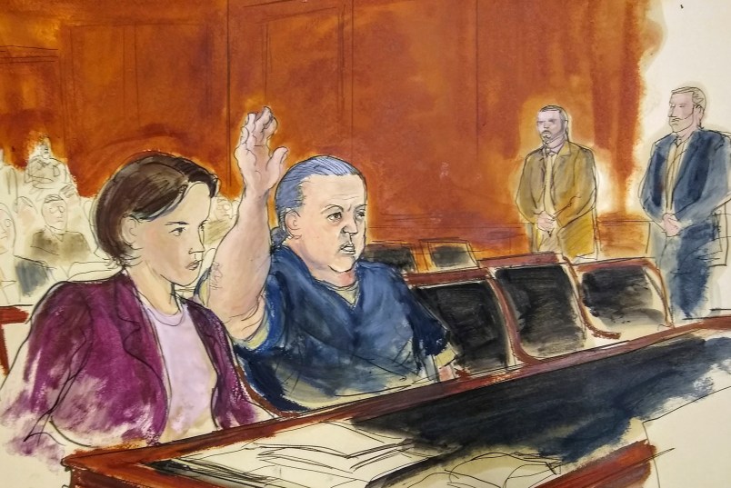 FILE- This Nov. 6, 2018 file courtroom sketch, pipe bomb suspect Cesar Sayoc raises his arm to swear to the truth of his statement of need for assigned counsel, during his presentment in Manhattan Federal Court in New York. he Florida man who authorities say sent pipe bombs to prominent critics of President Donald Trump, is expected to plead guilty in Manhattan federal court on Thursday, March 21, 2019. (Elizabeth Williams via AP)