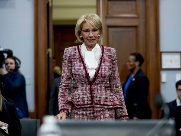 Education Secretary Betsy DeVos arrives for a House Appropriations subcommittee hearing on budget on Capitol Hill in Washington, Tuesday, March 26, 2019. (AP Photo/Andrew Harnik)