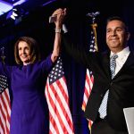 TOPSHOT - House Minority Leader Nancy Pelosi (D-CA) and Representative Ben Ray Lujan (D-MN), DCCC Chairman, celebrate a projected Democratic Party takeover of the House of Representatives during a midterm election night party hosted by the Democratic Congressional Campaign Committee on November 7, 2018 in Washington, DC. (Photo by Brendan Smialowski / AFP) / ALTERNATIVE CROP        (Photo credit should read BRENDAN SMIALOWSKI/AFP/Getty Images)