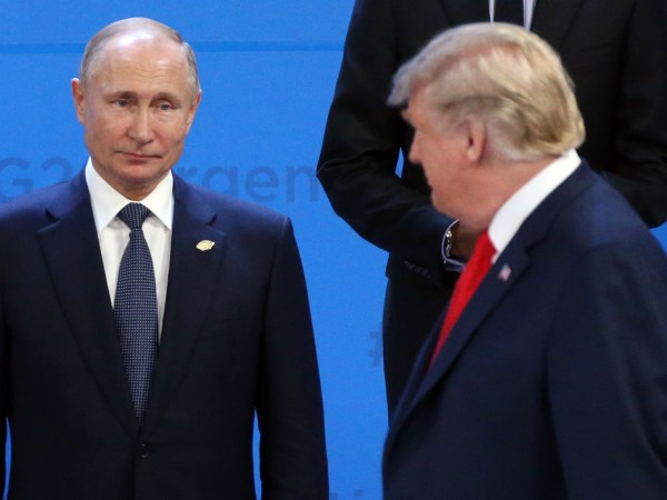 BUENOS AIRES, ARGENTINA - NOVEMBER,30 (RUSSIA OUT) U.S. President Donald Trump (R) looks on Russian President Vladimir Putin (L) during the family photo at the G20 Summit's Plenary Meeting in Buenos Aires, Argentina, November,30,2018. U.S.Preisident Donald Trump has cancelled his meeting with Vladimir Putin at the G20 Summit in Argentina planned on Saturday. (Photo by Mikhail Svetlov/Getty Image