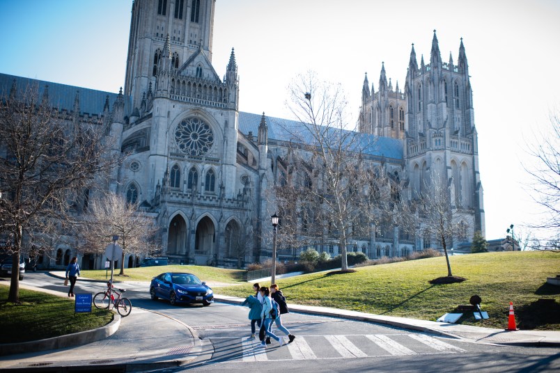WASHINGTON, DC - JANUARY 25: People walk near Washington National Cathedral. Massachusetts Avenue Heights is a neighborhood in DC that is bounded to the north by Woodley Road, to the southwest by Massachusetts Avenue, to the east by 34th Street NW, and to the west by Wisconsin Avenue. (Photo by Sarah L. Voisin/The Washington Post)