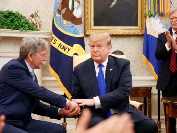 WASHINGTON, DC - MARCH 06: Danny Burch (L), former United States hostage in Yemen greets President Donald Trump inside the Oval Office of the White House on March 6, 2019 in Washington, DC. (Photo by Tom Brenner/Getty Images)