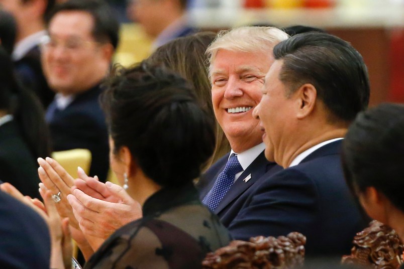 U.S. President Donald Trump and China's President Xi Jinping attend at a state dinner at the Great Hall of the People in Beijing, China, November 9, 2017. REUTERS/Thomas Peter  BEIJING, CHINA - NOVEMBER 9:  U.S. President Donald Trump and first lady Melania arrive for the state dinner with China's President Xi Jinping and China's first lady Peng Liyuan at the Great Hall of the People on November 9, 2017 in Beijing, China. Trump is on a 10-day trip to Asia.  (Photo by Thomas Peter - Pool/Getty Images)