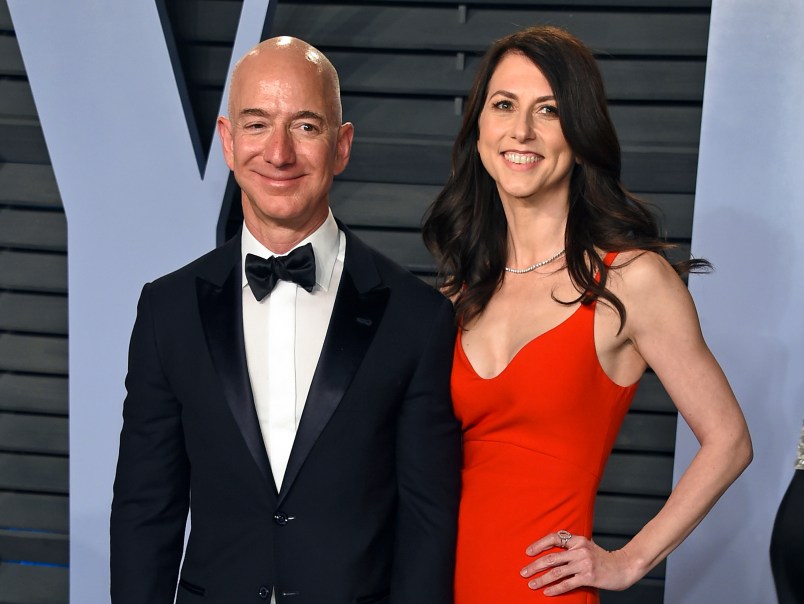 FILE - In this March 4, 2018 file photo, Jeff Bezos and wife MacKenzie Bezos arrive at the Vanity Fair Oscar Party in Beverly Hills, Calif. Bezos says he and his wife, MacKenzie, have decided to divorce after 25 years of marriage. Bezos, one of the world’s richest men, made the announcement on Twitter Wednesday, Jan. 9, 2019. (Photo by Evan Agostini/Invision/AP, File)