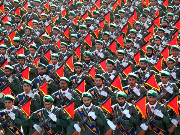 Iran's Revolutionary Guard troops march in a military parade marking the 36th anniversary of Iraq's 1980 invasion of Iran, in front of the shrine of late revolutionary founder Ayatollah Khomeini, just outside Tehran, Iran, Wednesday, Sept. 21, 2016. Iran's chief of staff of the armed forces said Wednesday a $38 billion aid deal between the United States and Israel makes Iran more determined to strengthen its military. In comments broadcast live on Iranian state TV, Gen Mohammad Hossein Bagheri said the U.S.-Israel aid deal "will make us more determined in strengthening the defense power of the country." (AP Photo/Ebrahim Noroozi)