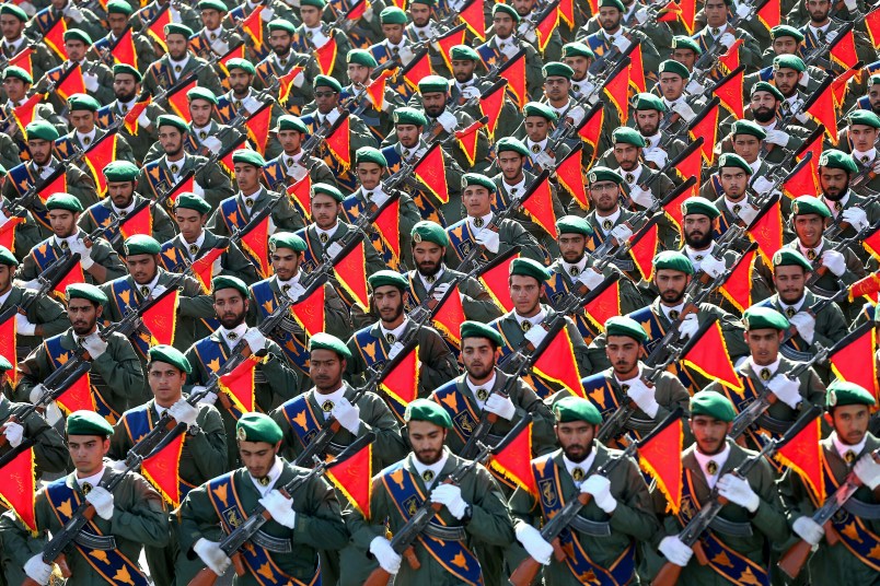 Iran's Revolutionary Guard troops march in a military parade marking the 36th anniversary of Iraq's 1980 invasion of Iran, in front of the shrine of late revolutionary founder Ayatollah Khomeini, just outside Tehran, Iran, Wednesday, Sept. 21, 2016. Iran's chief of staff of the armed forces said Wednesday a $38 billion aid deal between the United States and Israel makes Iran more determined to strengthen its military. In comments broadcast live on Iranian state TV, Gen Mohammad Hossein Bagheri said the U.S.-Israel aid deal "will make us more determined in strengthening the defense power of the country." (AP Photo/Ebrahim Noroozi)