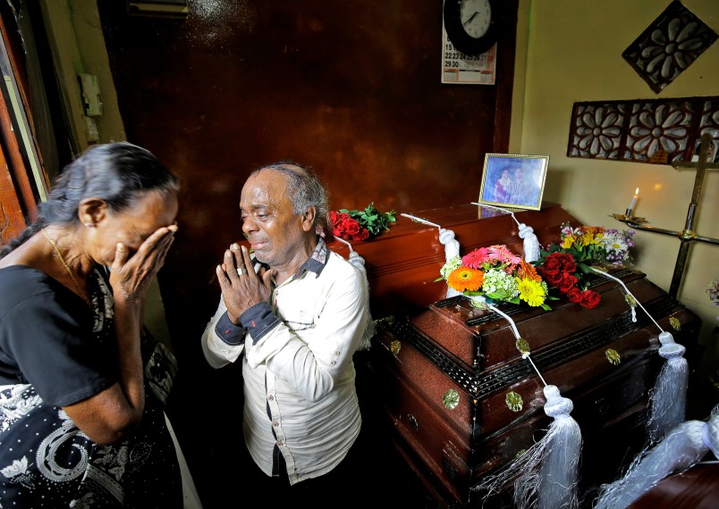 A Sri Lankan man weeps over the deaths of his three children who died in an explosion at the St. Anthony's church on Easter Sunday in Colombo, Sri Lanka, Tuesday, April 23, 2019. (AP Photo/Eranga Jayawardena)